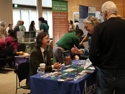 senior expo with people visiting expo tables
